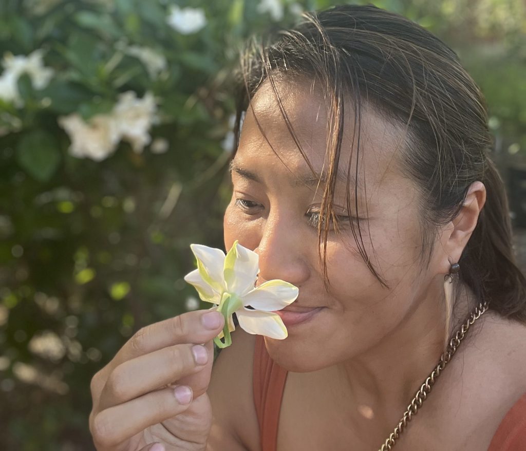 Inhaling the scent of gardenia